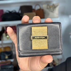 See By Chloe Black and Gold Wallet